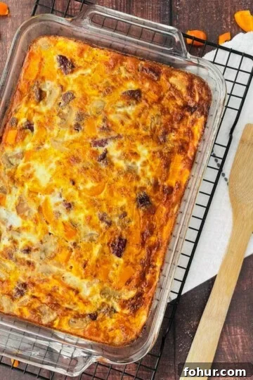 Oven baked fluffy omelet casserole made with fresh peppers, cheese, and ham.