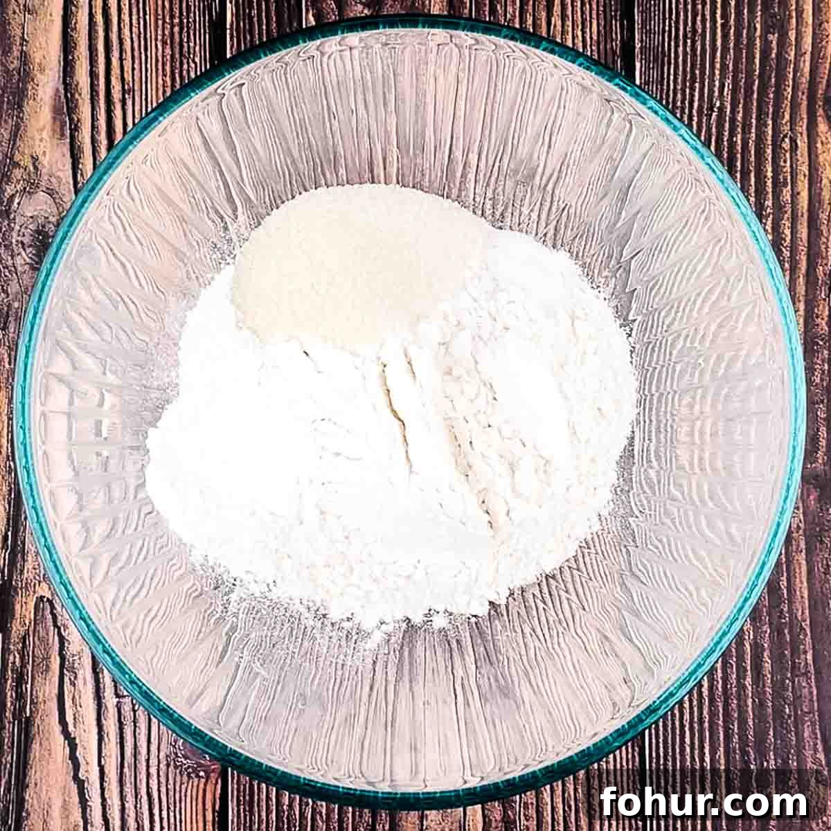 How to Make Fluffy Banana Pancakes 3 The dry ingredients in a large bowl.
