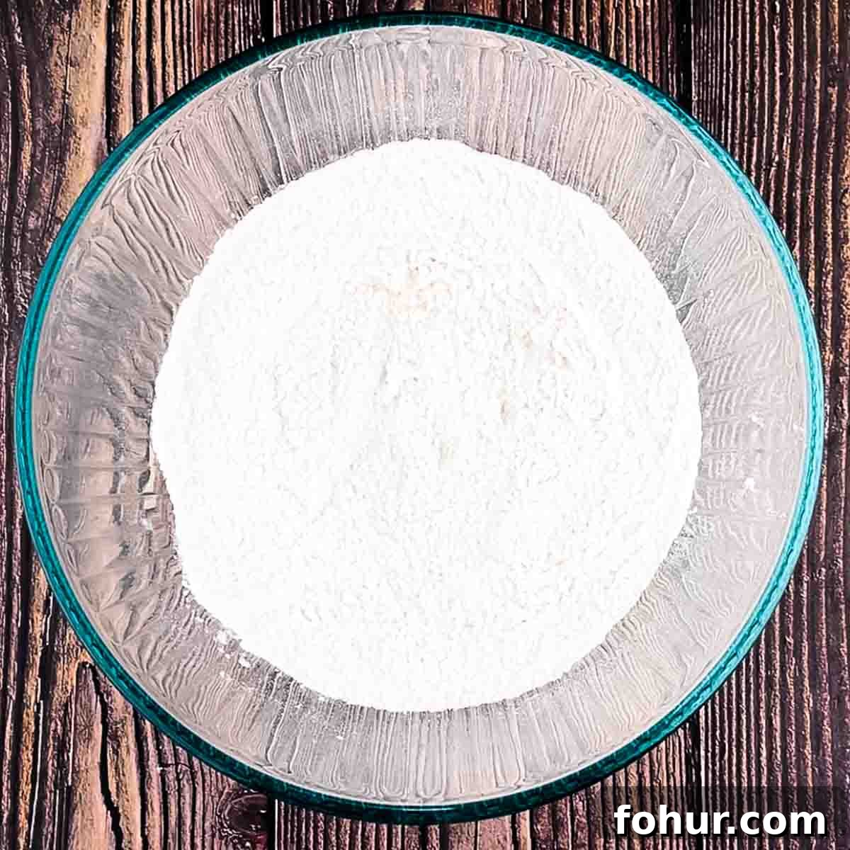 How to Make Fluffy Banana Pancakes 4 Dry ingredients mixed in a bowl.