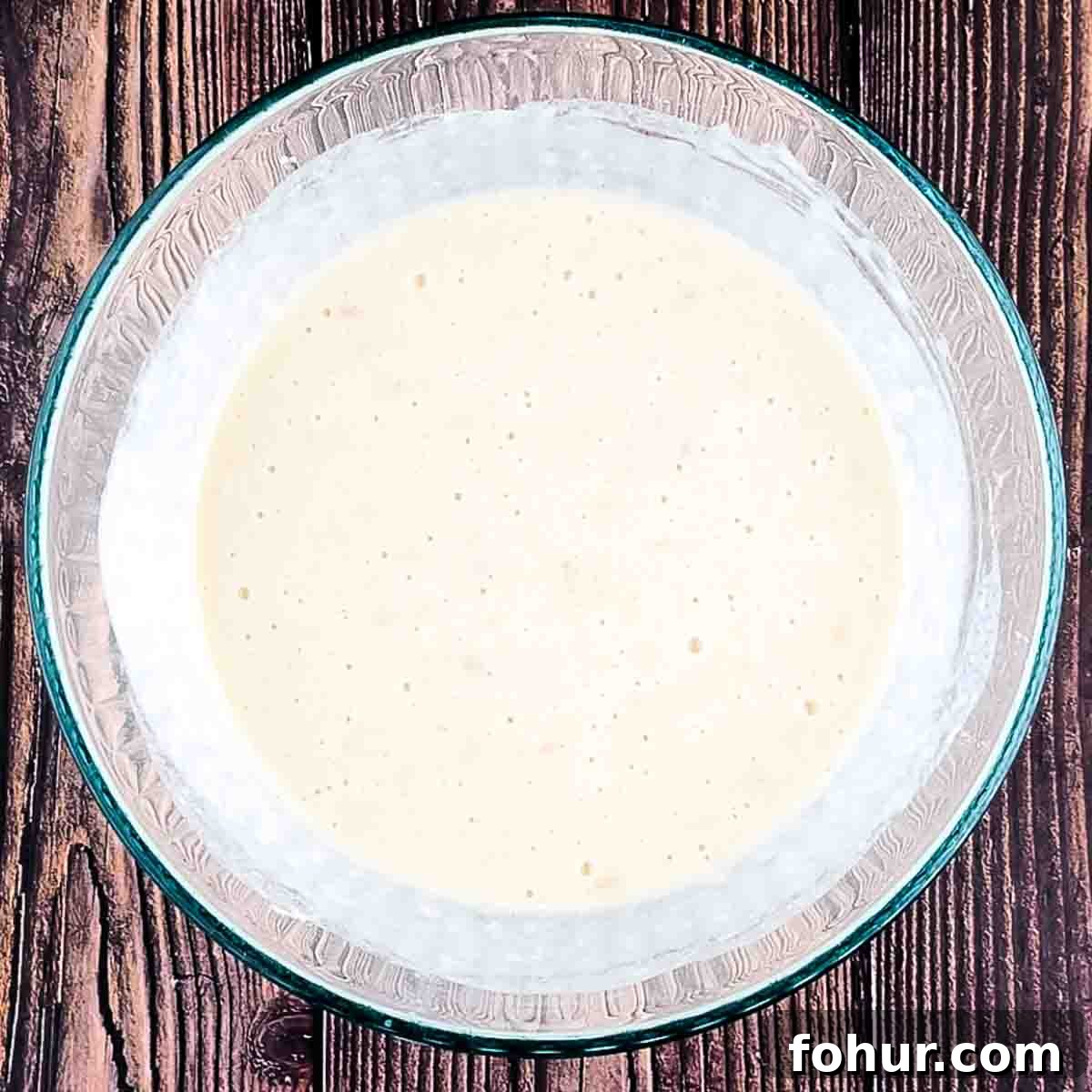 How to Make Fluffy Banana Pancakes 8 The pancake batter mixed in a large bowl.