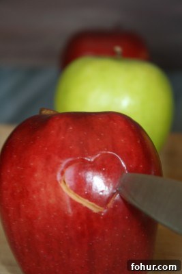 Heart-Shaped Apple Slices: How to Cut Apples into Hearts 2 removing cut heart from apple