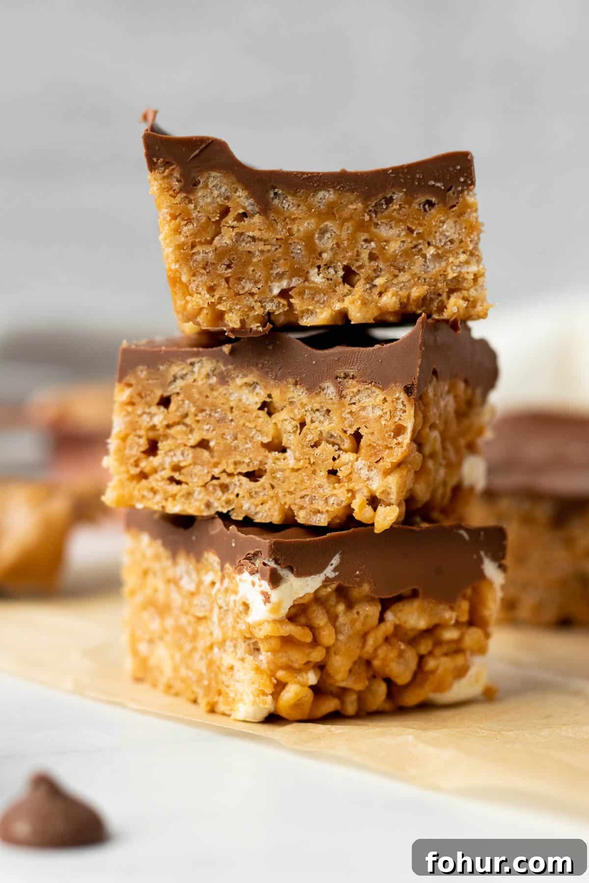 stack of chocolate peanut butter rice krispie treats