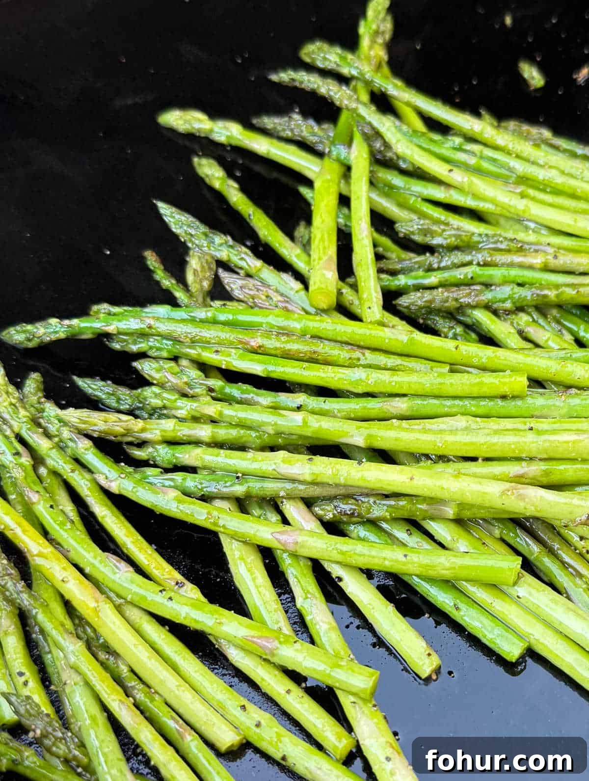 Blackstone Griddle Asparagus Recipe: Quick Grilled Asparagus 2 grilled asparagus spears on the Blackstone.
