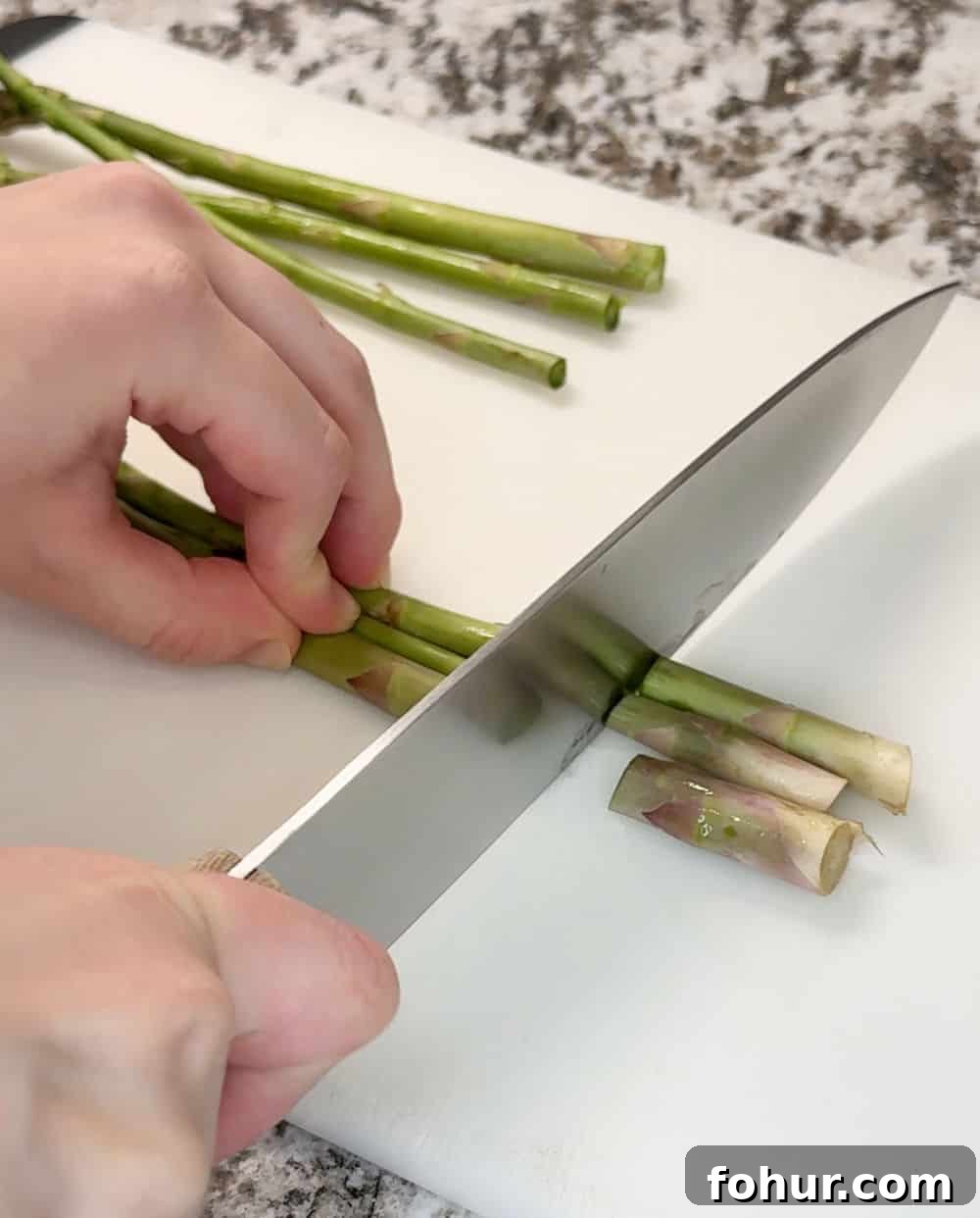Blackstone Griddle Asparagus Recipe: Quick Grilled Asparagus 4 cut ends off asparagus with knife.