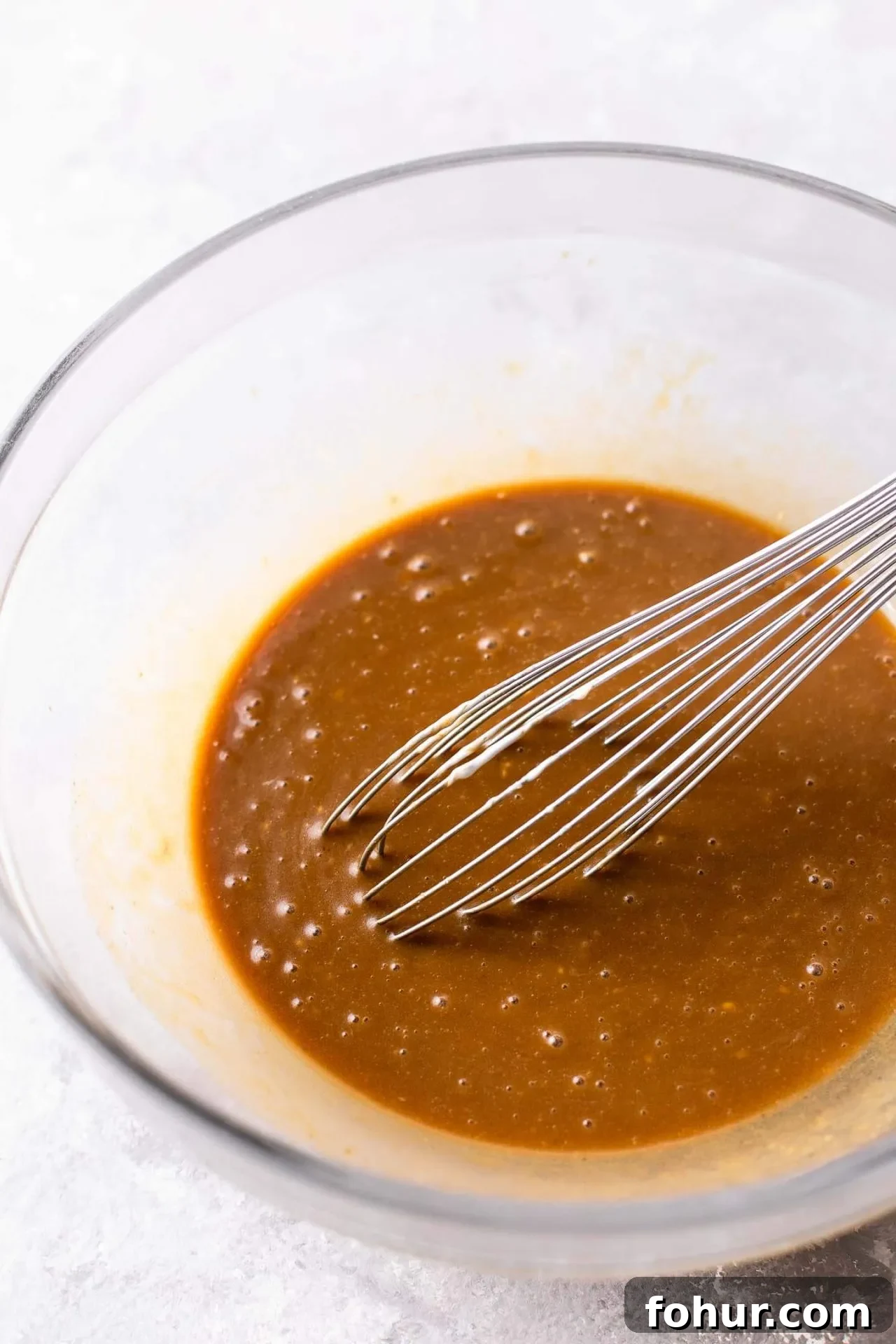 actual coffee coffee cake batter wet ingredients whisked together in bowl