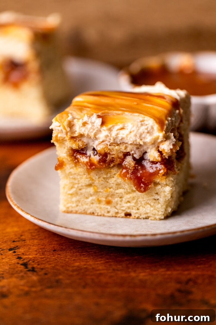 Brown Butter Caramel Cake with Salted Caramel Glaze 2 One slice of cake on a plate.
