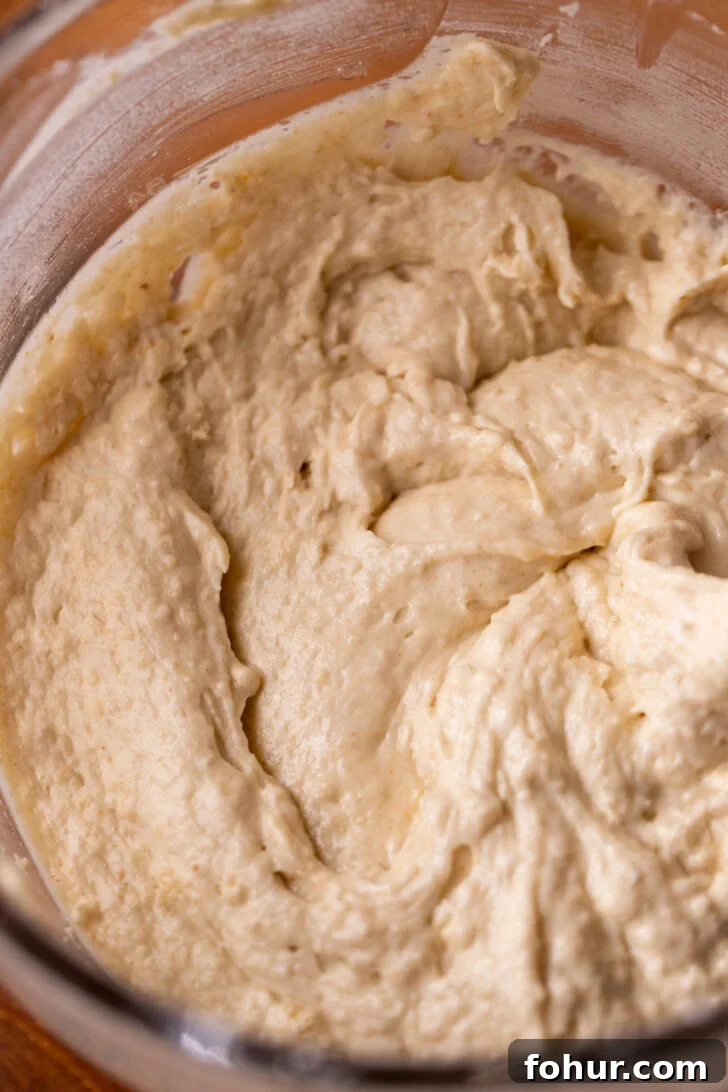 Brown Butter Caramel Cake with Salted Caramel Glaze 4 Cake batter in a bowl.