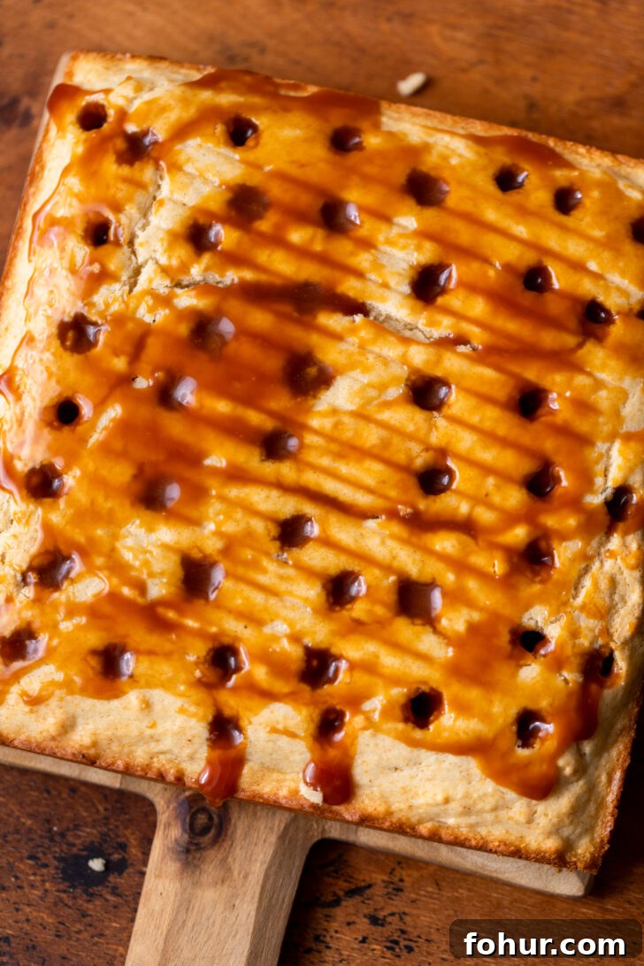 Brown Butter Caramel Cake with Salted Caramel Glaze 6 Poked cake with caramel.