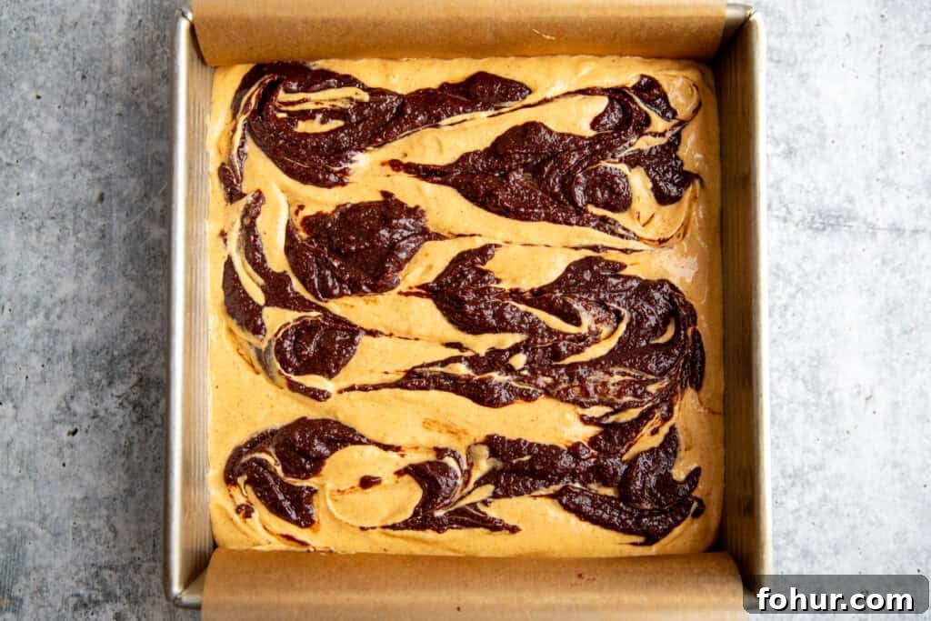 Fudgy Pumpkin Cheesecake Swirl Brownies Recipe 8 swirled batters ready to be baked