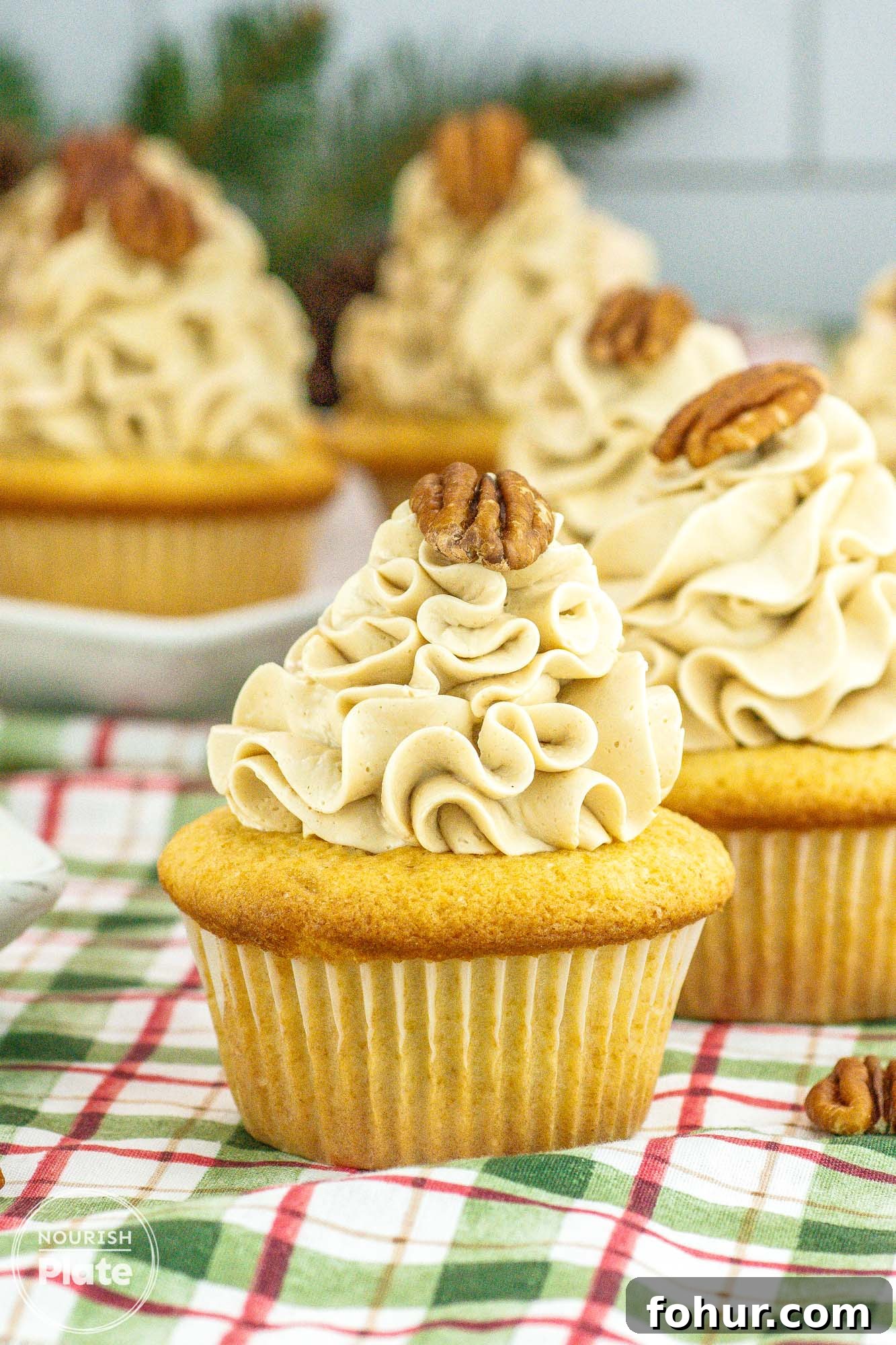 Pecan Pie Cupcakes Recipe 13 Pecan pie cupcakes frosted with buttercream and topped with a pecan half