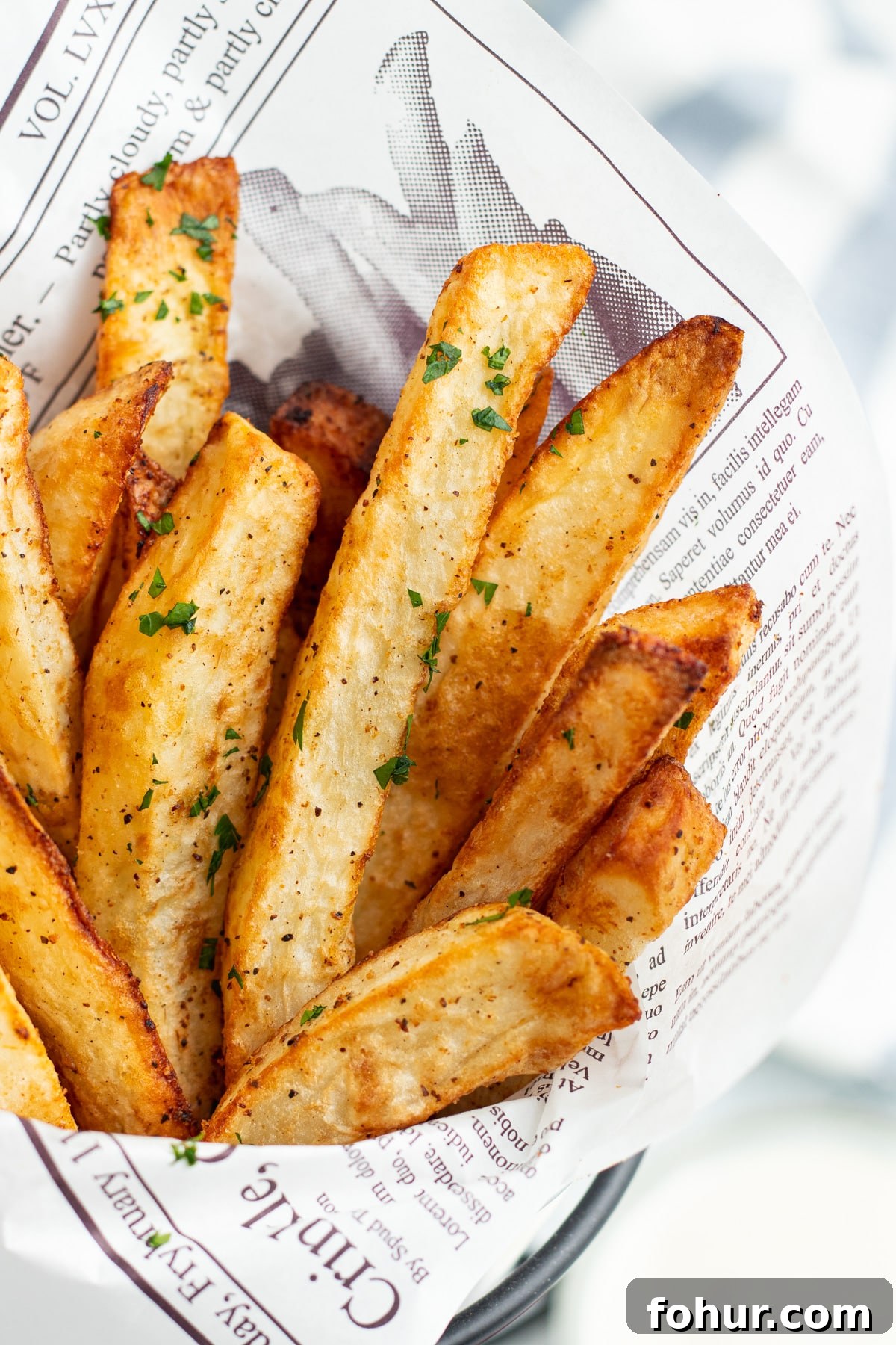 Crispy Air Fryer Steak Fries Recipe 3 Close up view of cooked air fryer steak fries.