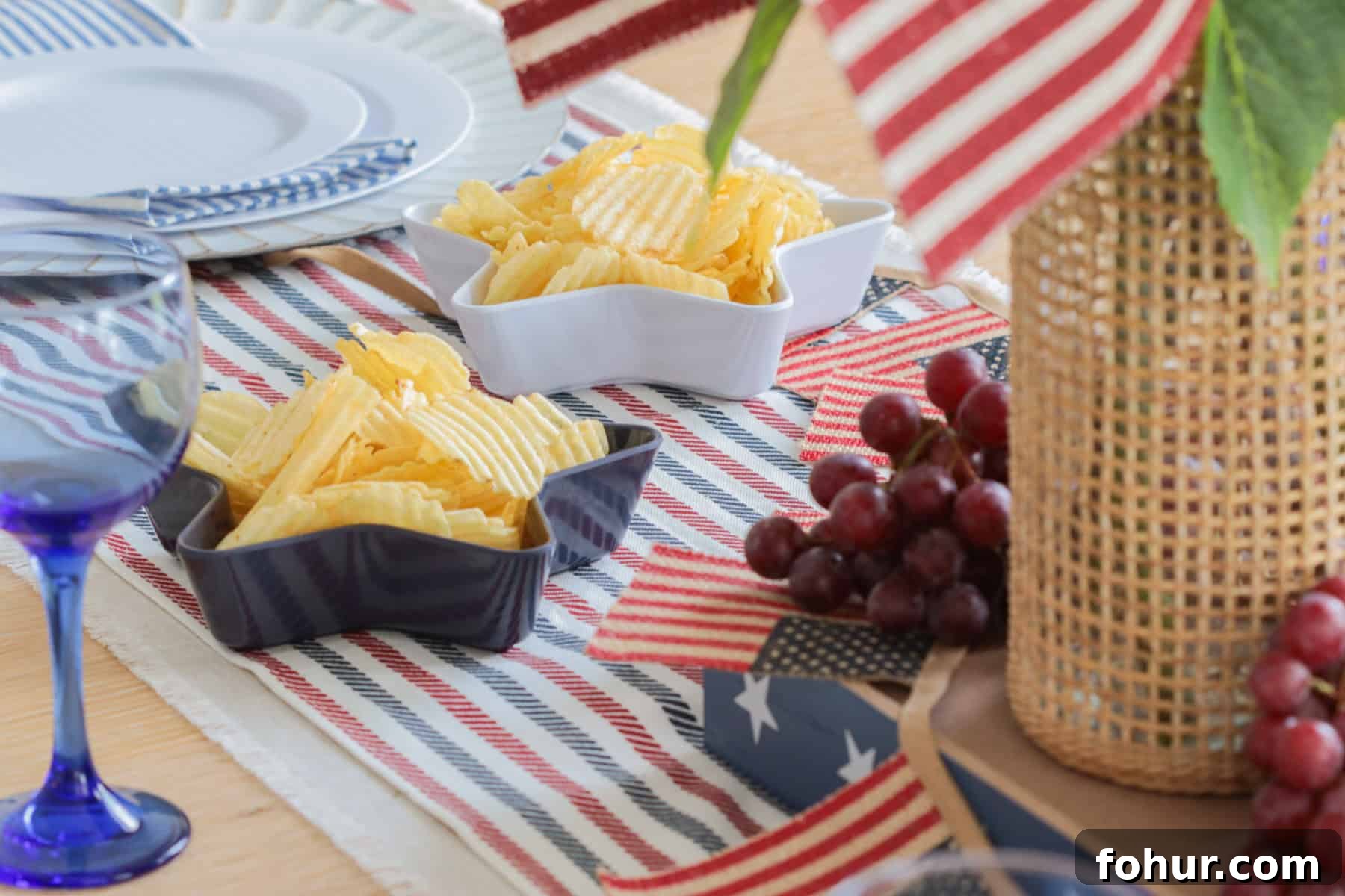 4th of July Tablescape Ideas for Festive Patriotic Decor 14 Chips in star plates on table.