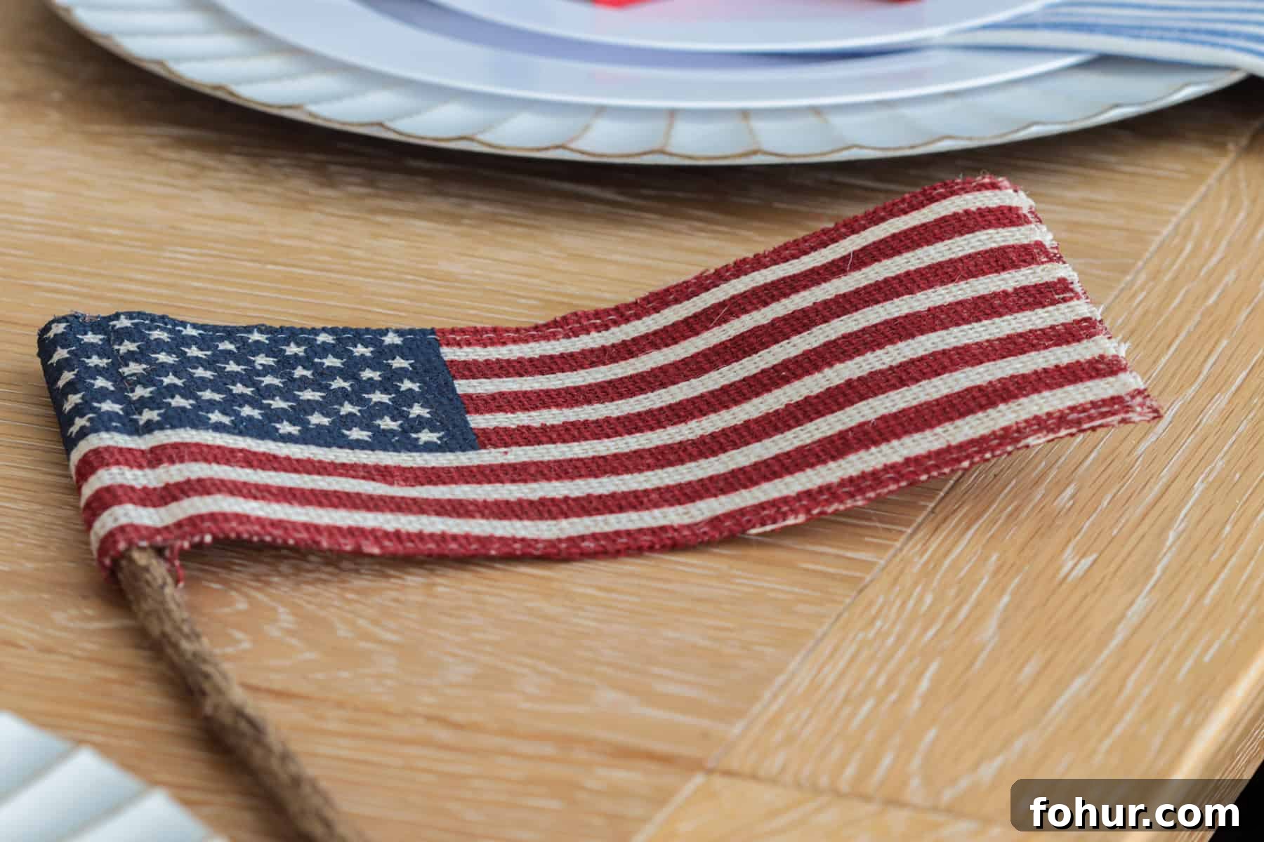 4th of July Tablescape Ideas for Festive Patriotic Decor 8 American flag on table.