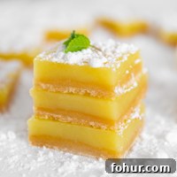 Square photo of some vegan lemon bars