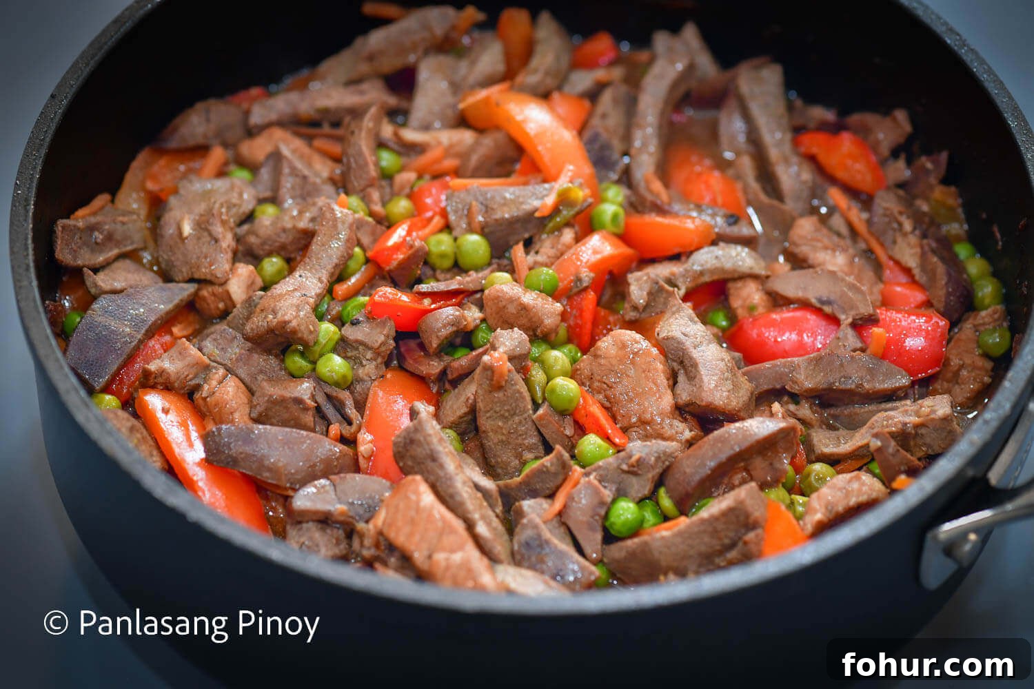 pork liver with tenderloin green peas and bell pepper