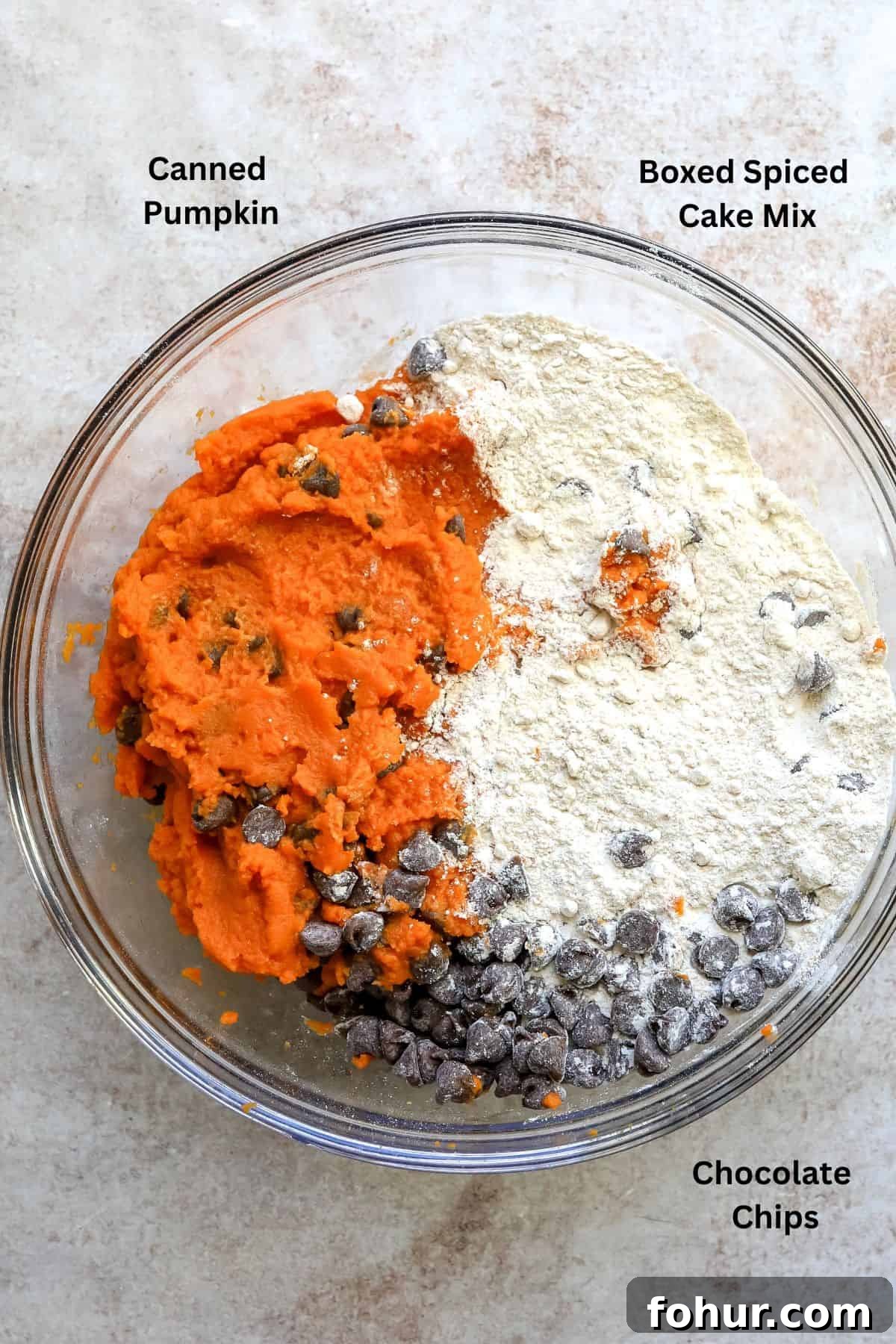 3-Ingredient Pumpkin Muffins Recipe 3 Glass bowl with ingredients in it.