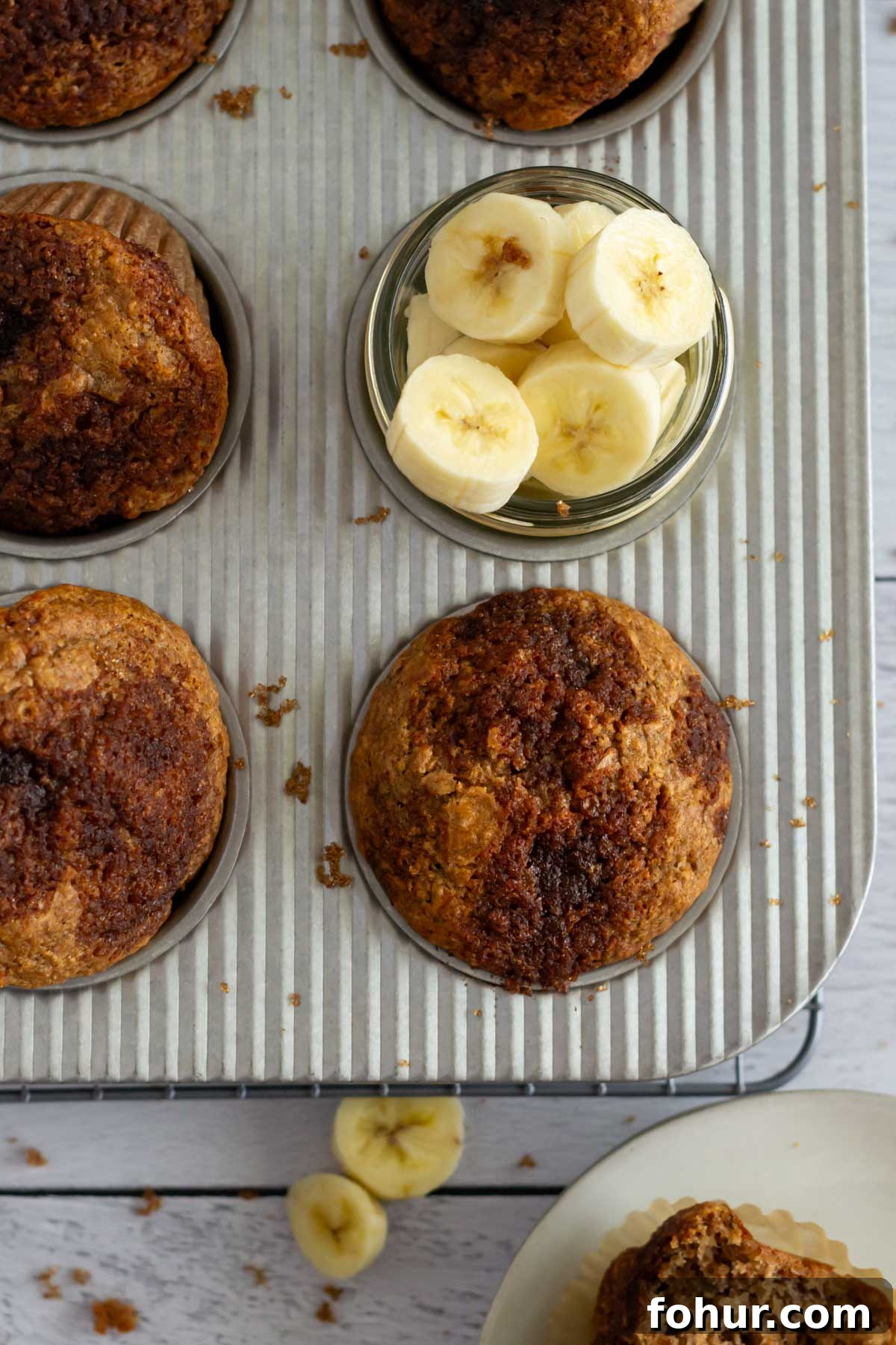 Small-Batch Banana Muffins Recipe (Makes 6) 3 muffins with banana slices