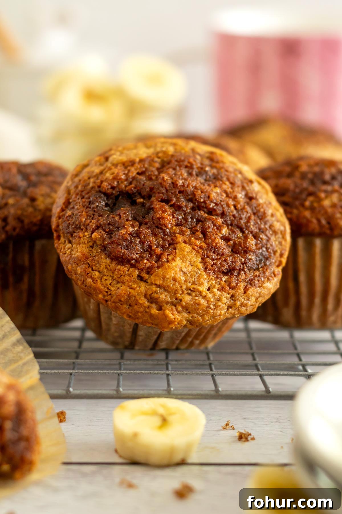 Small-Batch Banana Muffins Recipe (Makes 6) 8 muffin on a cooling rack