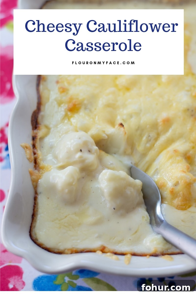 February Seasonal Produce: What Is Fresh Now 9 A baking dish of cheesy Gouda Cauliflower Casserole with a spoon scooping a serving.