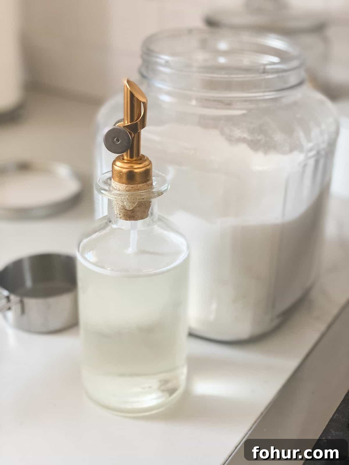 Simple Syrup Recipe in a glass jar with gold lid