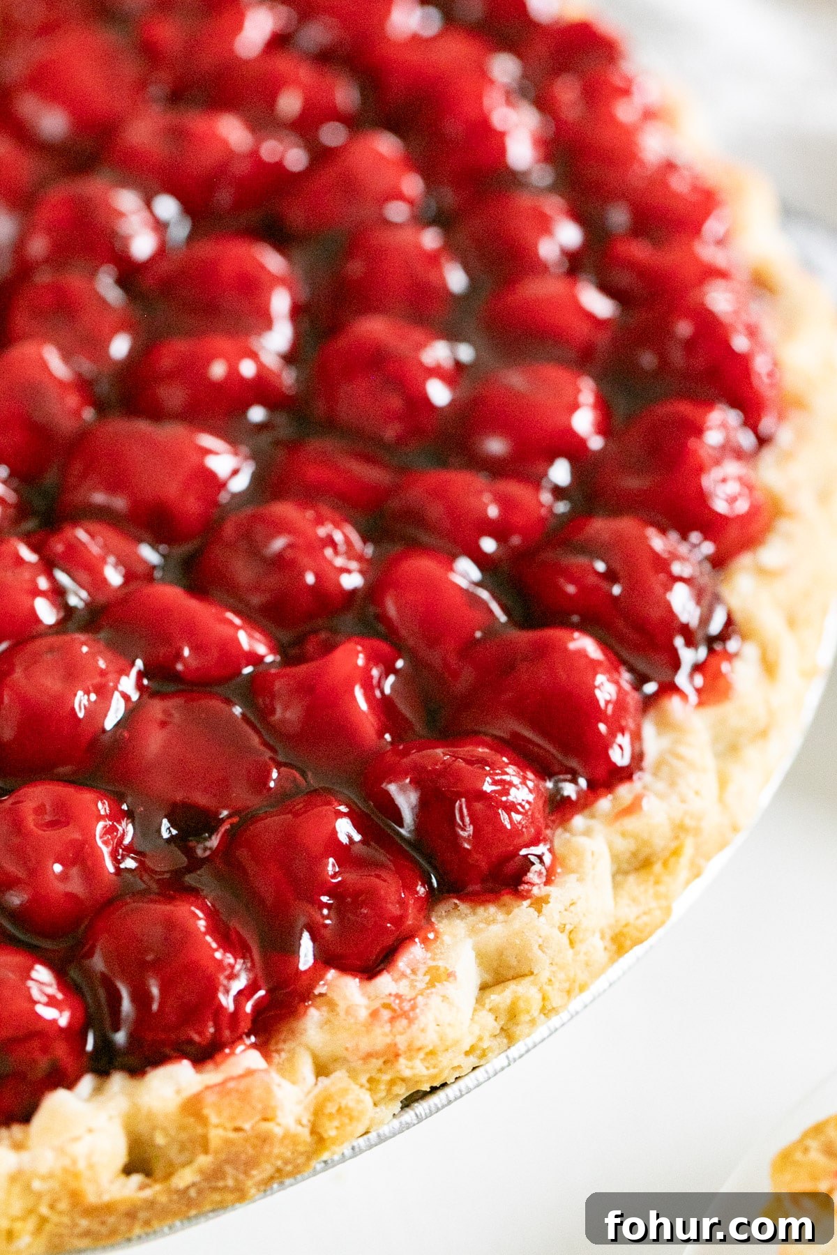 Cherry Cream Cheese Pie Recipe 11 A close up image of the top side of the cherries on this pie.