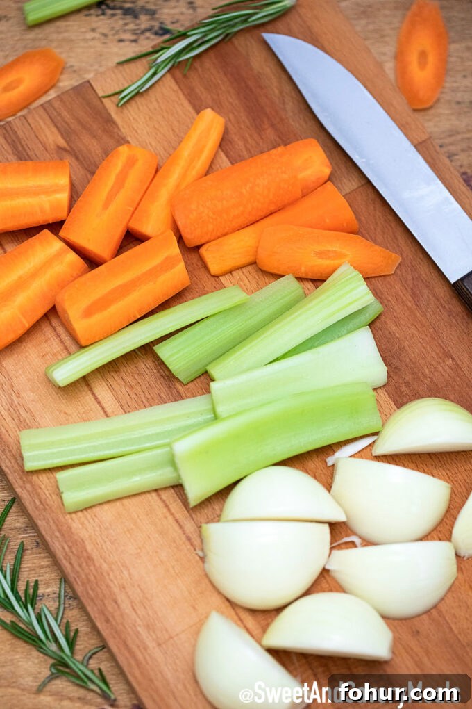 How to Make Homemade Chicken Stock from Scratch 3 Photo of chopped carrot celery and onion.