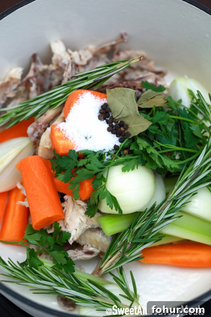 How to Make Homemade Chicken Stock from Scratch 4 Photo of chicken stock herbs.