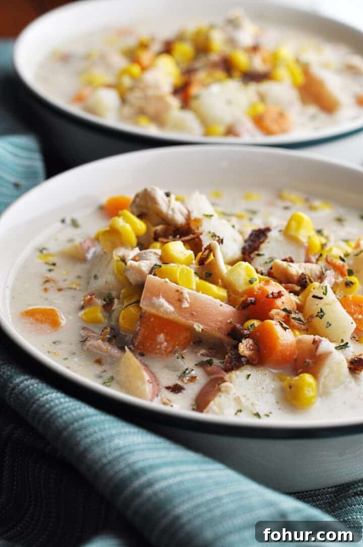Slow Cooker Chicken and Corn Soup Recipe 2 Soup with chicken corn and potatoes in bowl