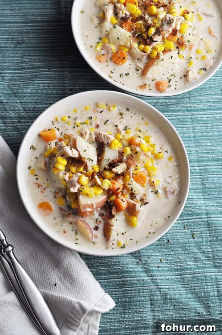 Slow Cooker Chicken and Corn Soup Recipe 3 Chicken chowder in bowl with corn and potatoes