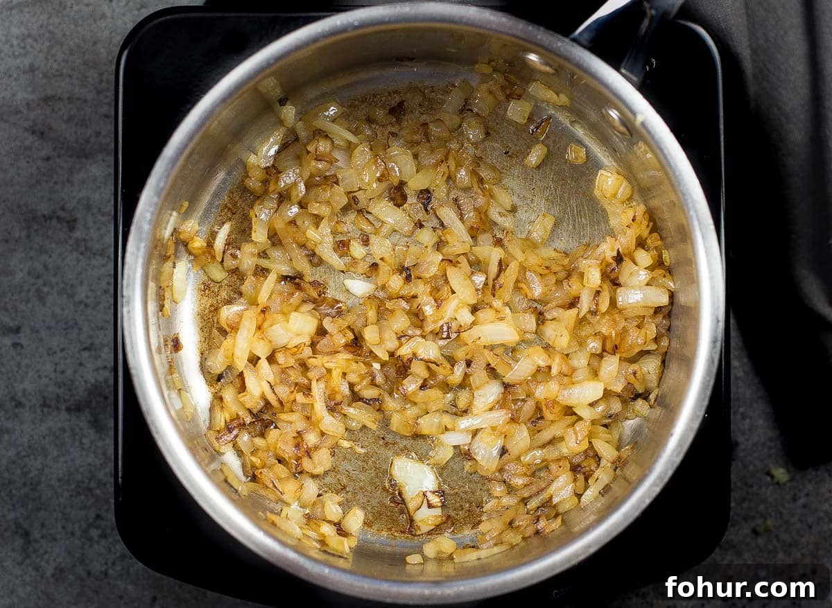 Sugar-Free Spicy Mango BBQ Sauce 2 Caramelized onions in a large pot