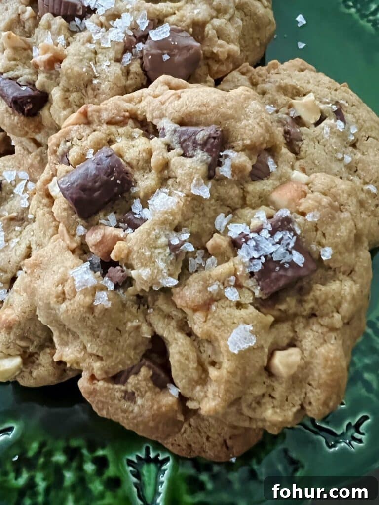 Chocolate Chip Cookies with Peanut Butter Cups, Sea Salt and Nuts 8 Close up of Peanut Butter Cup Chocolate Chip Cookies with large pieces of flaky sea salt.