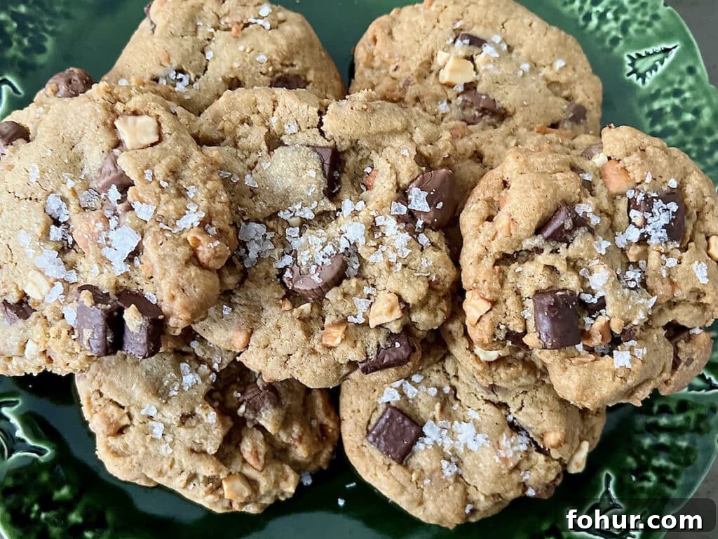 Chocolate Chip Cookies with Peanut Butter Cups, Sea Salt and Nuts 9 Close up of Peanut Butter Cup Chocolate Chip Cookies with large pieces of flaky sea salt.