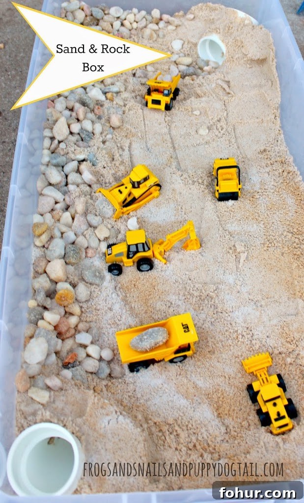 a plastic box with sand, rocks, and toy trucks for a fun fall activities for preschoolers
