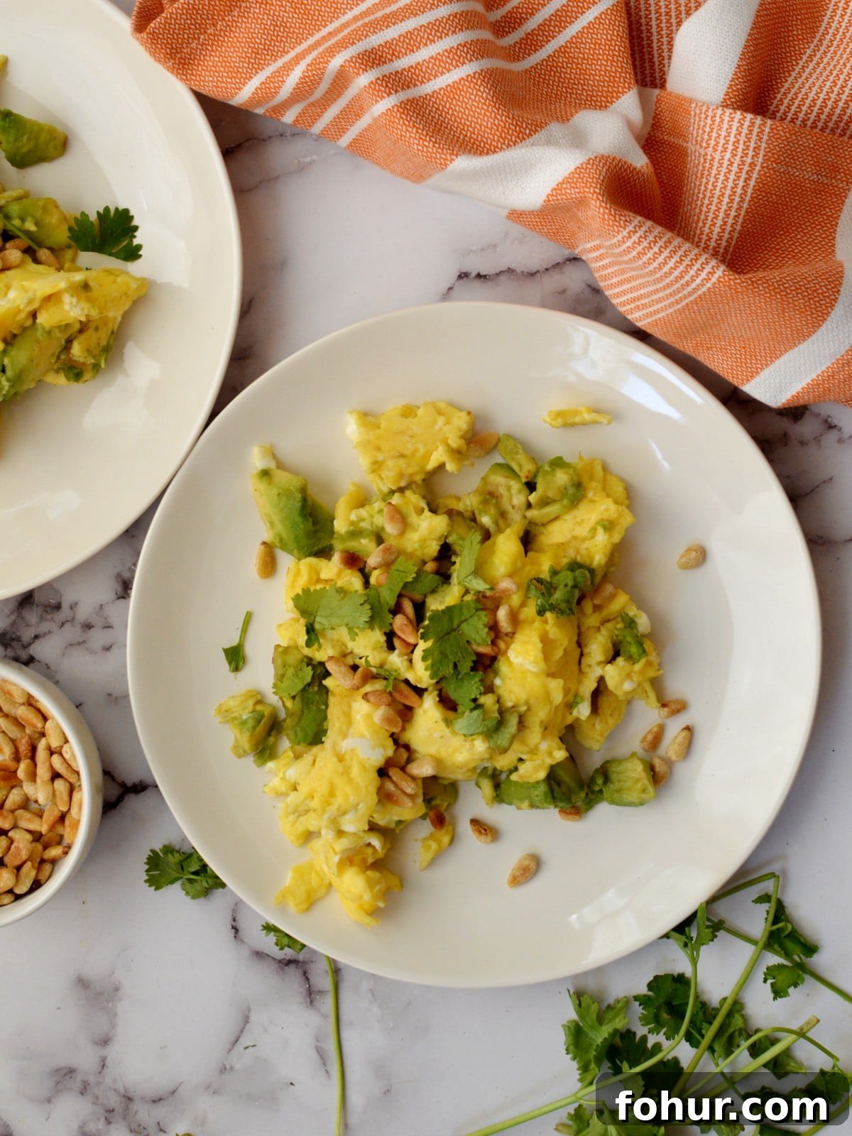 Creamy Avocado Scrambled Eggs with Toasted Pine Nuts 2 scrambled eggs with avocado