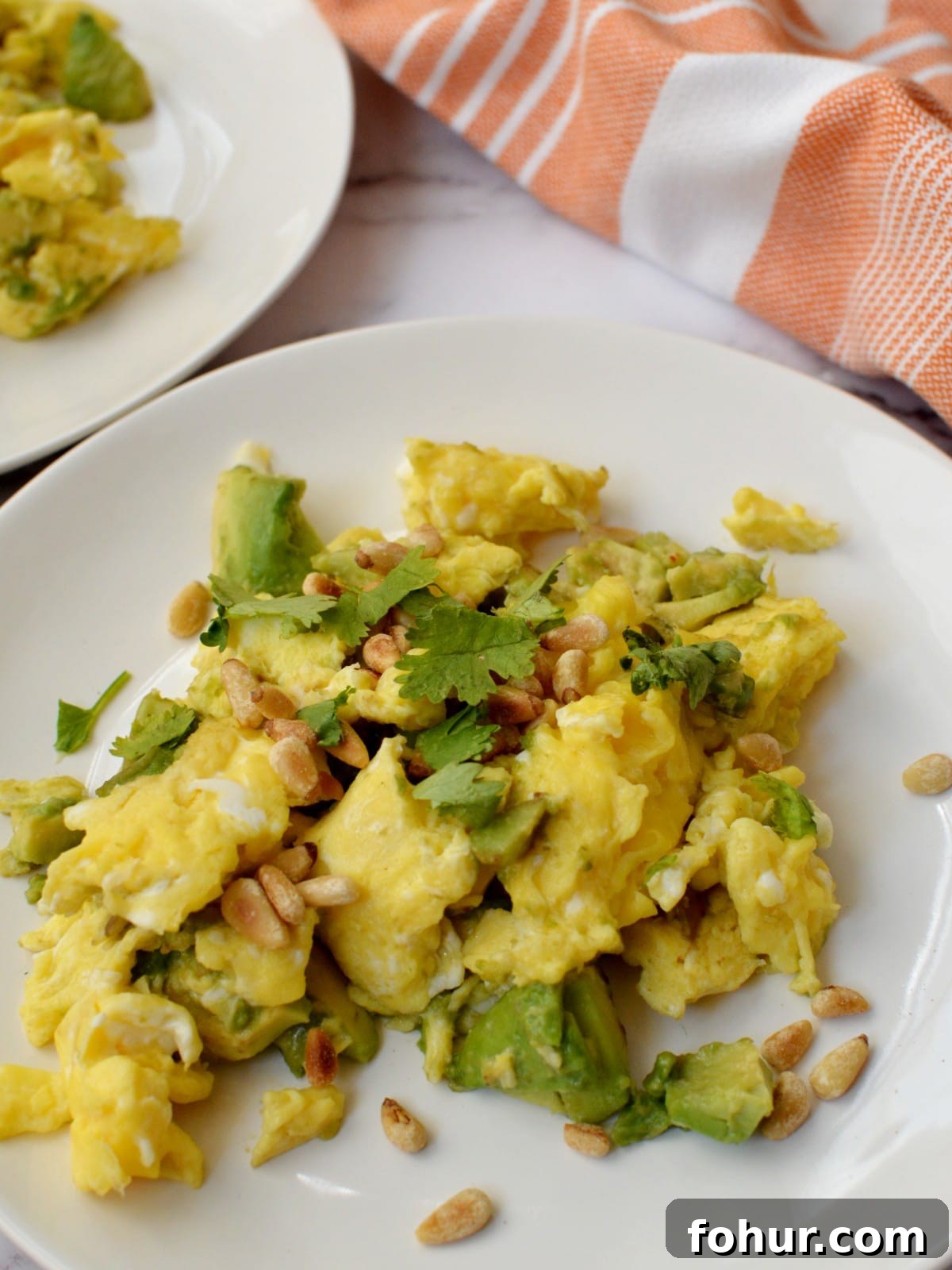 Creamy Avocado Scrambled Eggs with Toasted Pine Nuts 5 scrambled eggs with avocado and pine nuts