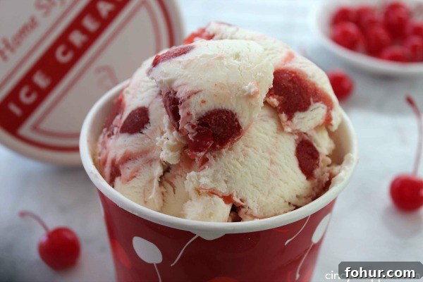 No-Churn Cherry Cheesecake Ice Cream Recipe 9 No Churn Cherry Cheesecake Ice Cream- Simple homemade cheesecake ice cream loaded with lots of cherries. So easy!