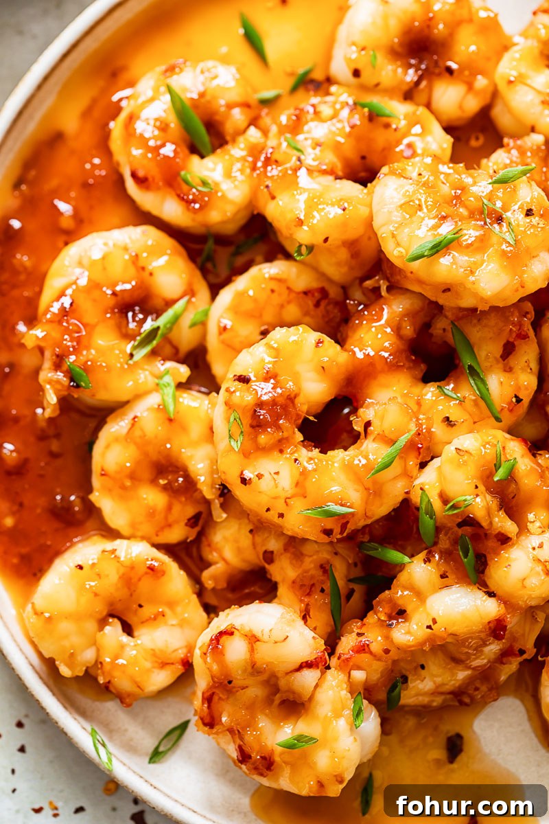 top down view of honey garlic shrimp on a plate.