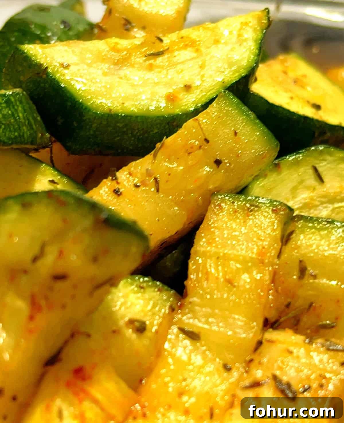 Crispy Air Fryer Zucchini Recipe 8 closeup of zucchini in the air fryer ready to eat