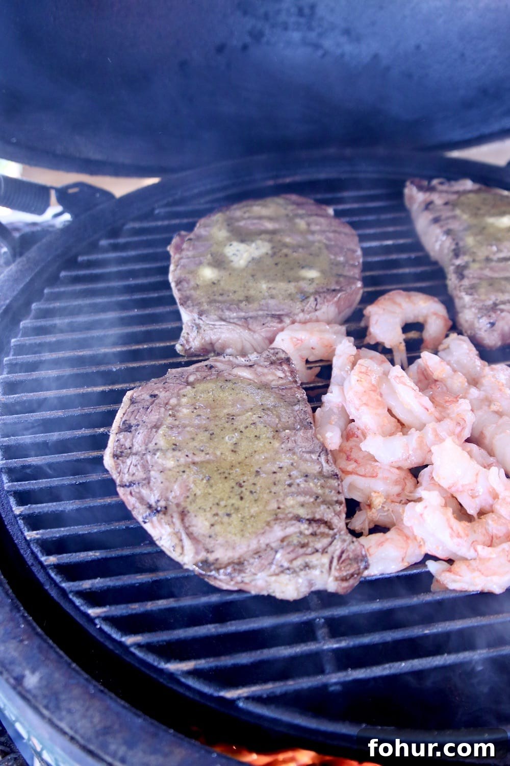 Grilling shrimp and ribeye steaks