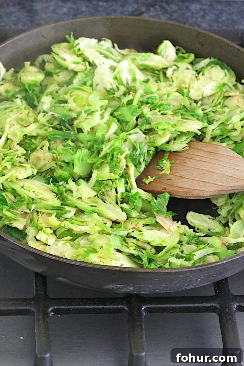 Shredded Brussels Sprouts Salad with Bacon, Apple and Gorgonzola