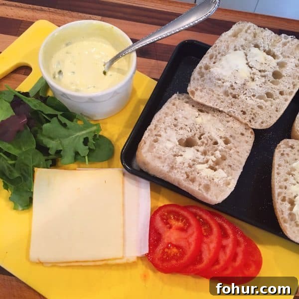 Crispy Fried Fish Sandwich Recipe with Tartar Sauce 2 Cutting board with Fish Sandwich Prep Items