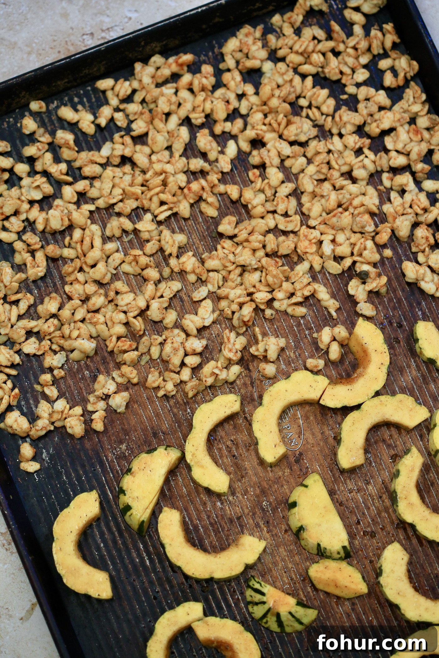 tempeh and squash on baking sheet uncooked