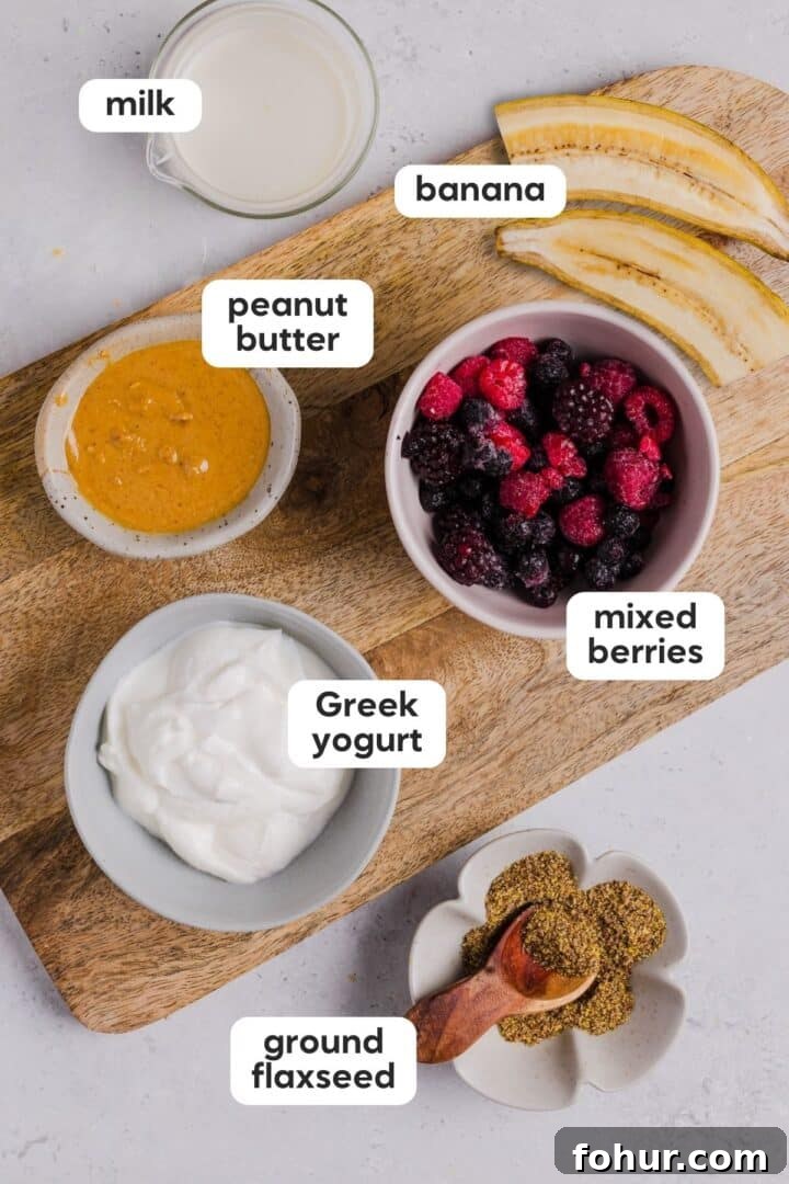 Creamy Peanut Butter and Mixed Berry Smoothie Recipe 2 Labeled photo of ingredients in peanut butter berry smoothie