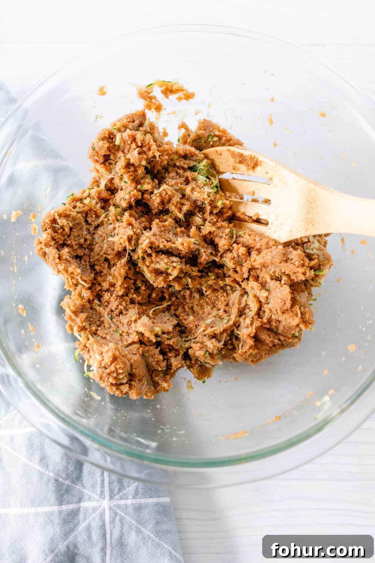 Moist Gluten-Free Zucchini Bread Recipe 7 Mixing in the shredded zucchini to the bread batter.