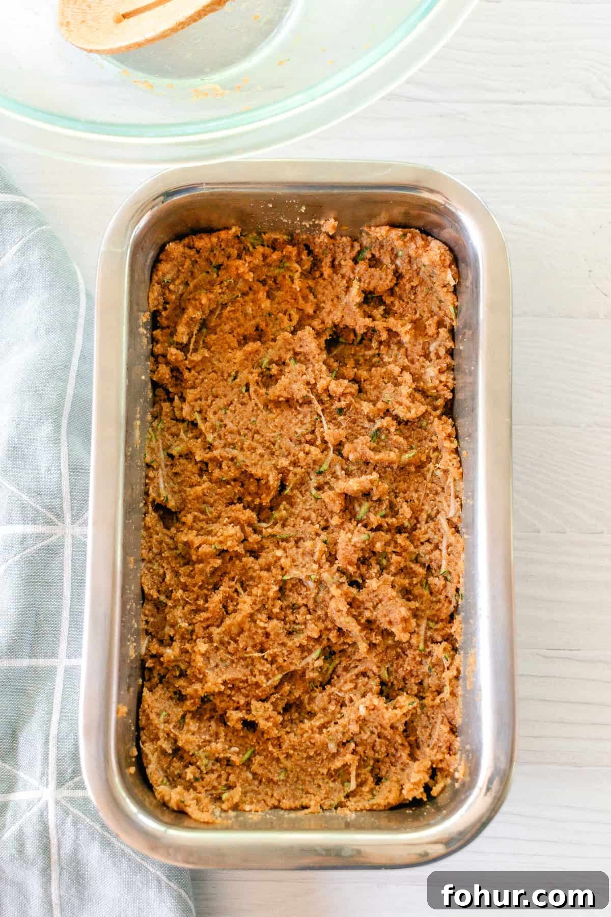Moist Gluten-Free Zucchini Bread Recipe 8 Bread batter spread into a loaf pan.