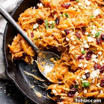 12 St. Patrick's Day Recipes to Make This Year 7 Braised cabbage and apples in a skillet with a spoon