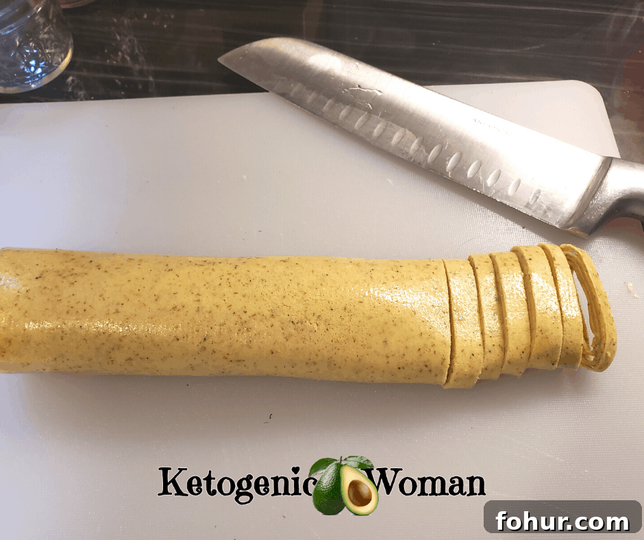 Keto Carnivore Noodles: Meat-Based Pasta Alternative 4 Cutting the Carnivore Noodles with a knife