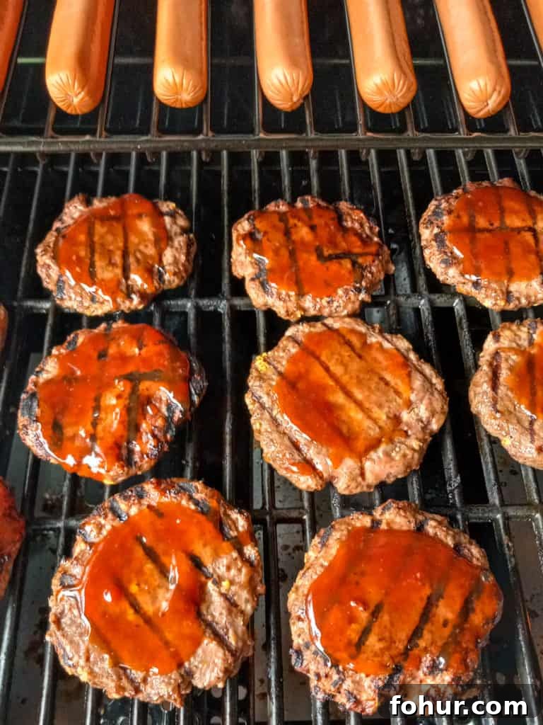 Amish-Style Grilled Burgers: Classic BBQ Recipe 7 barbecued burgers and hot dogs on the grill