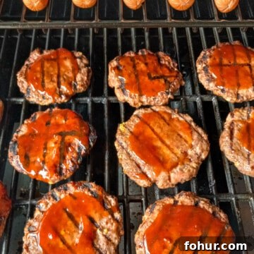 Amish-Style Grilled Burgers: Classic BBQ Recipe 10 hamburgers and hot dogs on the grill