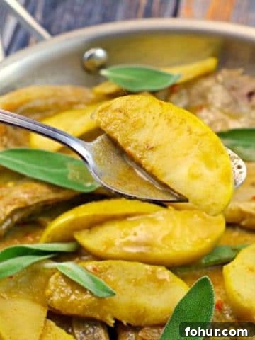 skillet pork chops with apples and sage in a skillet